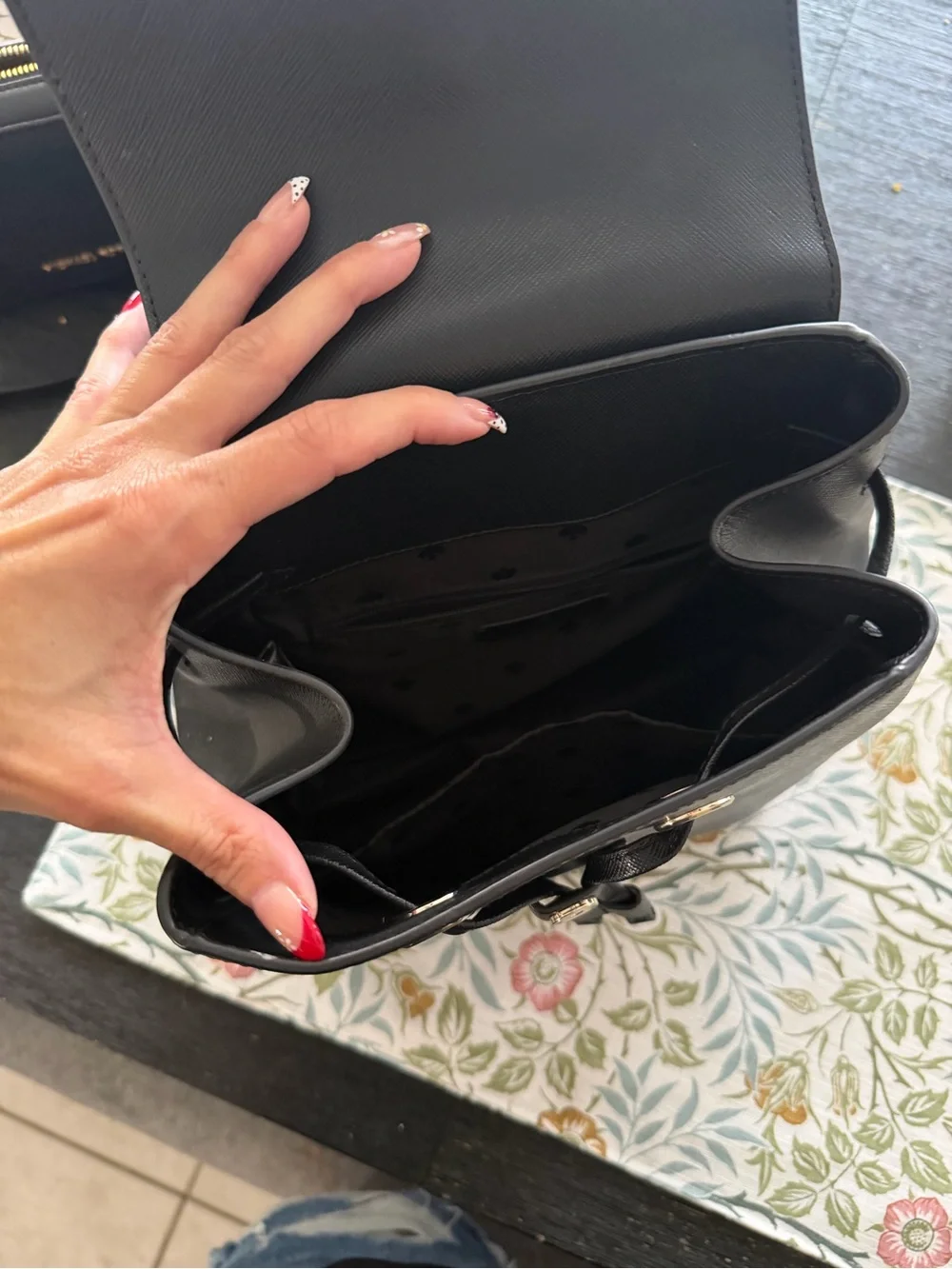 kate spade black saffiano leather drawstring backpack